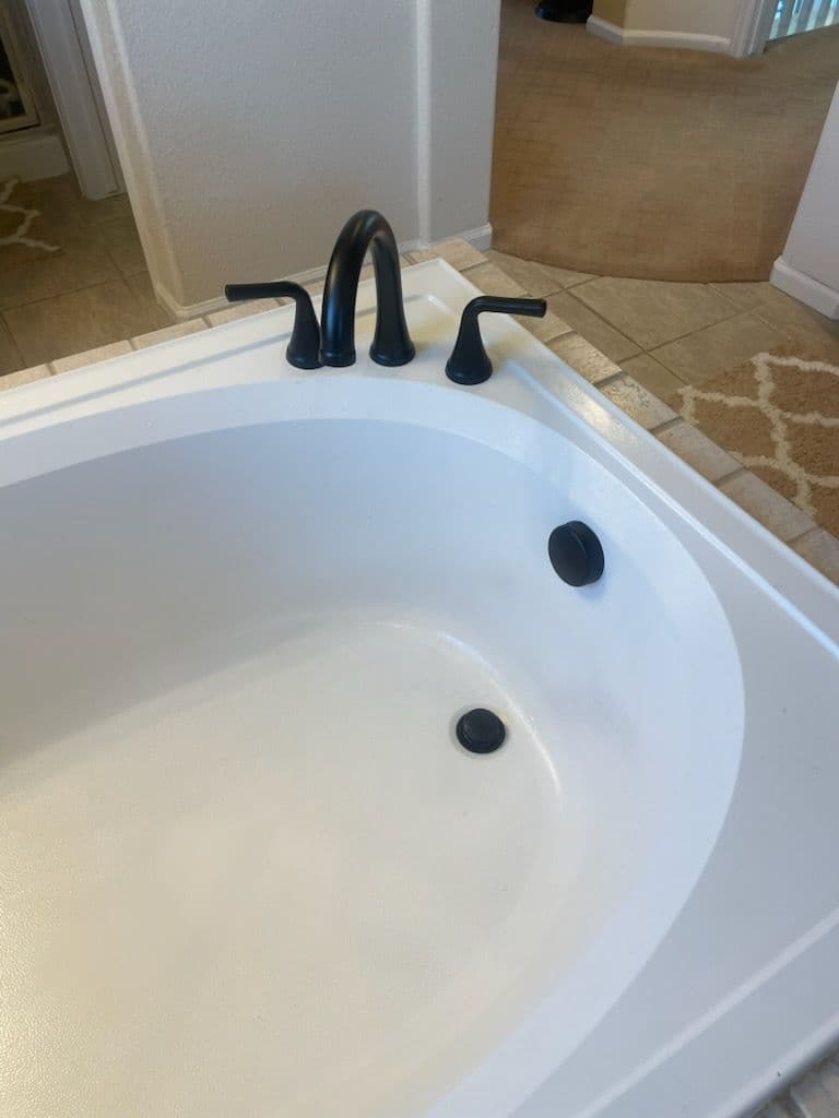 Modern Bathroom Upgrade with Sleek Black Fixtures