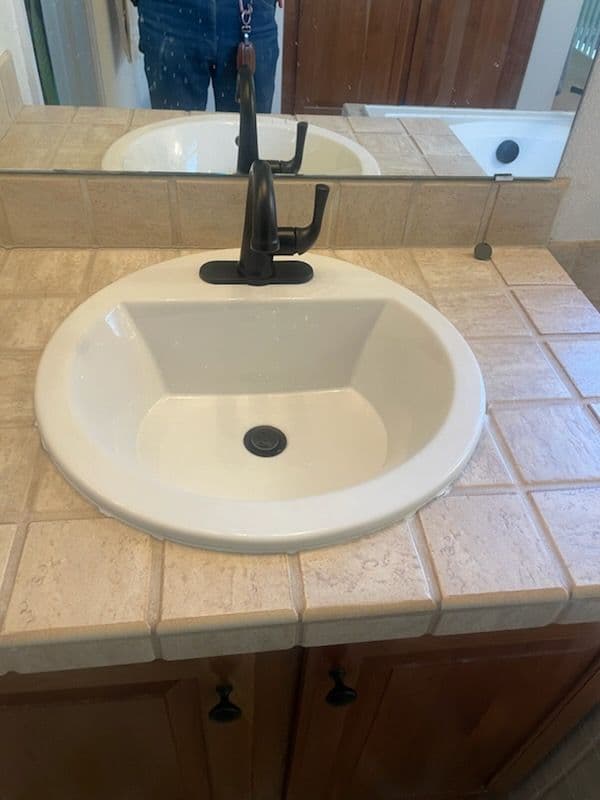 Modern Bathroom Upgrade with Sleek Black Fixtures