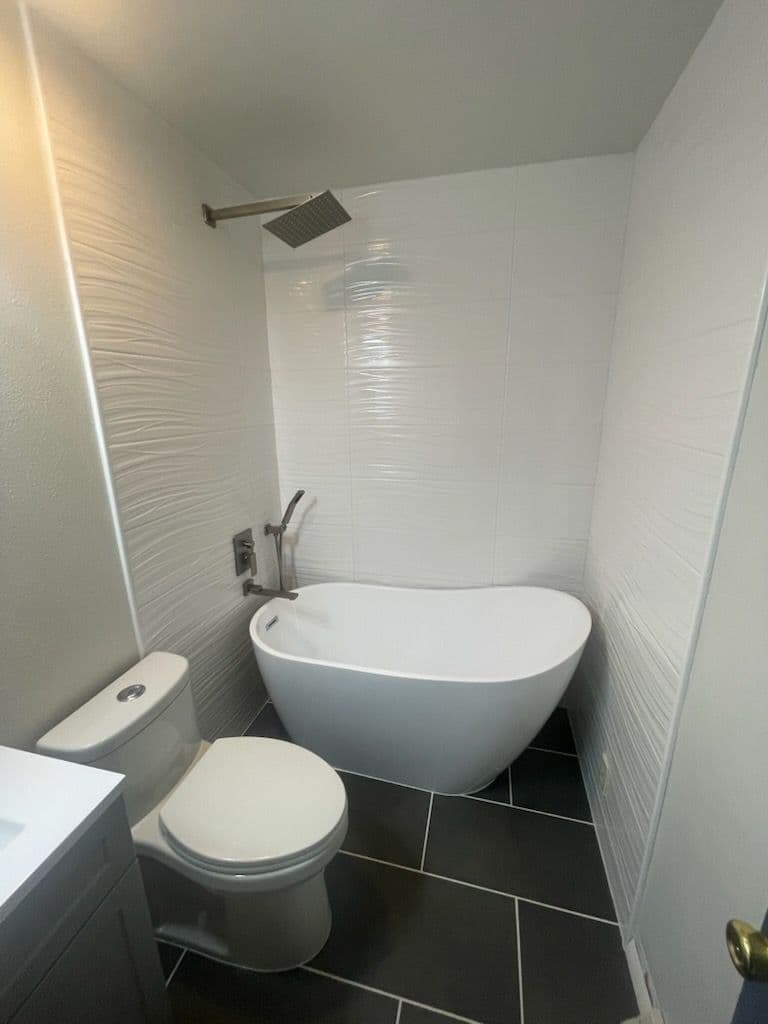 Gallery photos for Modern Bathroom Makeover with Dual-Flush Toilets: Image #2