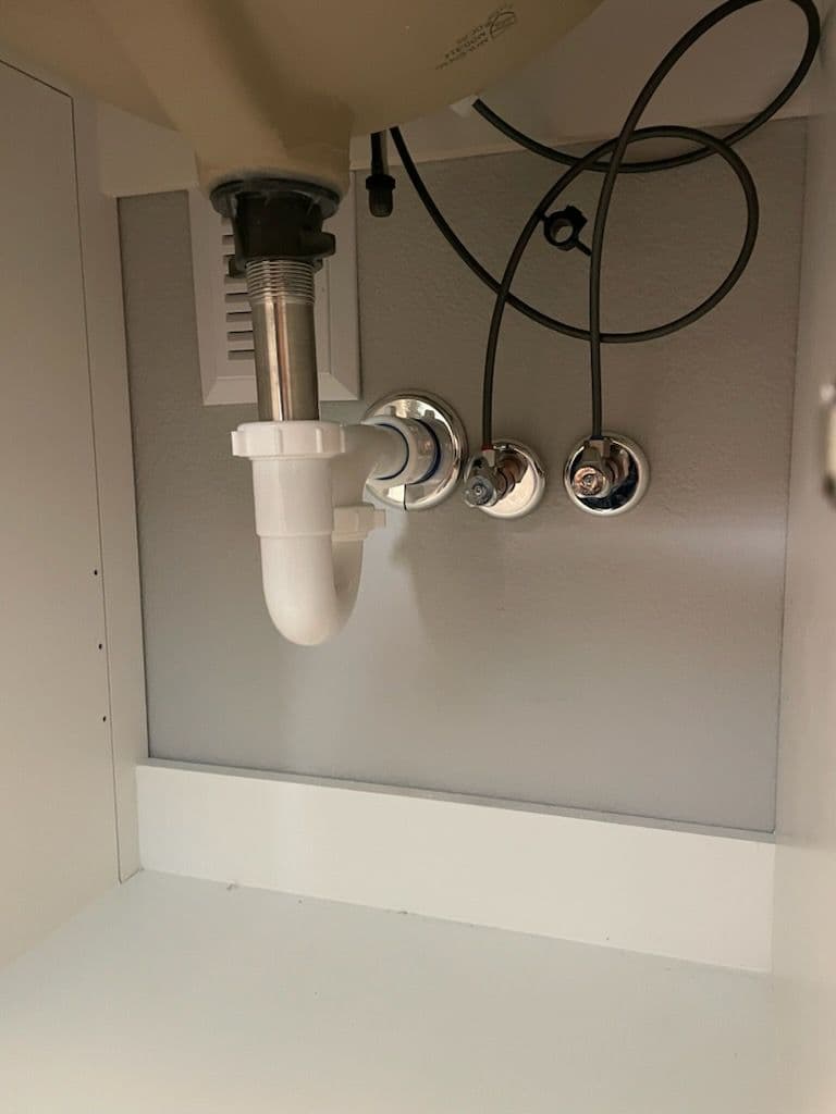 Gallery photos for Sleek Bathroom Transformation with Black Fixtures and Marble-like Tiles: Image #1